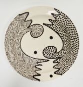 Mark Dally (b. 1958) an earthenware charger with black abstract slip trailed and spotted