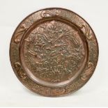 Keswick School of Industrial Arts, Arts & Crafts circular copper charger, the central repousse panel