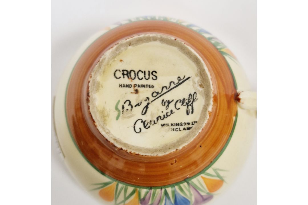 Clarice Cliff 'Crocus' pattern jug (15.5cm high), a cup & saucer and a lidded preserve jar (lid - Image 9 of 10