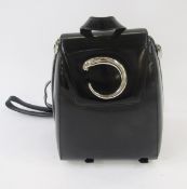 Cartier black patent leather 'Book Bag' with zip fastening (one side of zip damaged), the Cartier