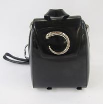 Cartier black patent leather 'Book Bag' with zip fastening (one side of zip damaged), the Cartier