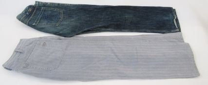 Assorted designer bellbottom jeans to include Diesel, Gucci, and a pair of men's blue suit