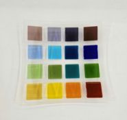 Joe Downs art glass shallow dish, square with four rows of four polychrome raised squares, 37cm