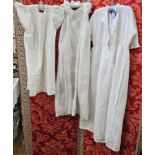 Four various christening gowns and petticoats to include broderie anglaise, pintuck with ribbon