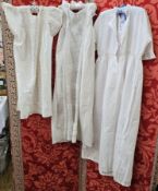 Four various christening gowns and petticoats to include broderie anglaise, pintuck with ribbon