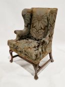 Late 19th / early 20th century wingback armchair in the George III manner, upholstered in a green