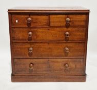 Victorian mahogany chest having two short and three long graduated drawers with turned wooden knob