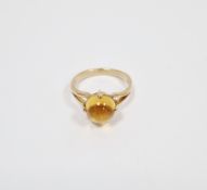 9ct yellow gold and citrine ring, comprising a claw-set single round cabochon citrine of