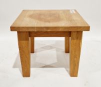 Modern pale oak coffee table of square form on thick square legs, 50cm high x 60cm wide
