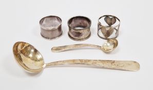 Three silver napkin rings, hallmarked Birmingham, 1899, engraved with a blank cartouche and