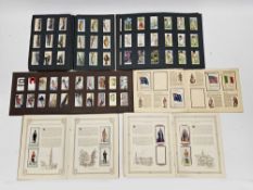 Collection of cigarette and tea cards including three early 20th century cigarette picture albums,