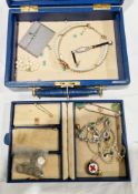 Early 20th century blue leather covered jewellery box containing various jewellery including pearl