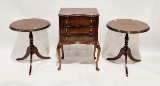 Pair of reproduction mahogany veneer circular occasional tables on tripod bases, a three-drawer