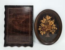 Early 20th century walnut parquetry inlaid tray of oval form, the inlay depicting a vase of flowers,