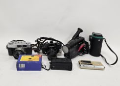 Collection of camera and equipment including Konica Auto S2 camera, Minolta SRT101b camera, cased