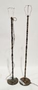 Pair of gilt and silvered brass standard lamps of turned baluster form, on circular platform