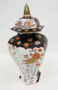 Imari inverted baluster faceted section vase and domed cover, painted in iron red, blue and