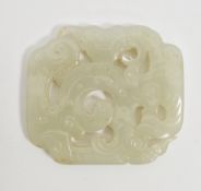 Chinese carved pale jade plaque, pierced with a scrolling dragon,perhaps Qing Dynasty, 6.5cm wide