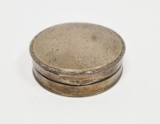 White metal trinket box, of round form having engine turned pattern decoration, the hinged lid