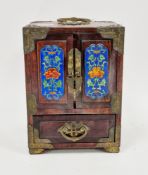 Chinese hardwood and brass-mounted jewellery cabinet, with enamelled panels, swing handled to top,
