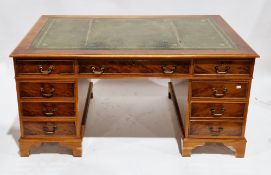 Yew wood twin-pedestal desk in the George III manner, the rectangular top with green leather inset