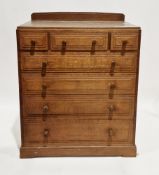 In the manner of the Brynmawr School Art Deco 1930's oak chest, the rectangular top with shaped back