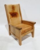 Robert 'Mouseman' Thompson of Kilburn oak easy chair with tan brown leather back and padded seat,