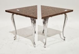 Pair of coffee tables of triangular form, having Balmoral red granite marble tops, on aluminium