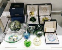 Large Mdina glass paperweight with swirled yellow, blue and green decoration, inscribed to base,