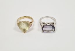 Lady's 9ct gold dress ring with a triangular pale green stone and a lady's 9ct white gold pale