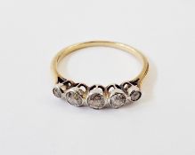 Early 20th century gold and diamond five-stone ring set five graduated collet-set stones, approx 2.