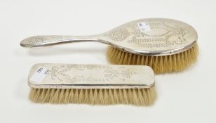 Early 20th century assembled silver-backed dressing table set, comprising: a clothes brush and a