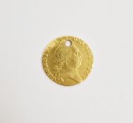 Georgian gold guinea with pendant loop hole, 1788, 8g approx.