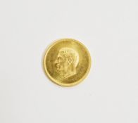 Persian gold medal commemorating 2,500 years of the Persian Empire, featuring Mohammad Reza Shah