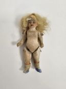 Early 20th century continental bisque miniature doll, with blonde hair, painted facial features,