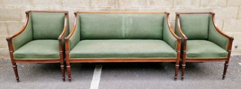 Edwardian style three piece suite, square-backed mahogany framed with green upholstery, comprising