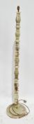 Mid century onyx floor lamp, with turned baluster column on a circular stepped base, 147cm high