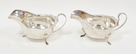 Pair of George V silver sauceboats, Sheffield 1933, Viners Limited, each with wavy rim, loop handle,