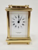 Gilt metal carriage clock, battery operated, retailed by Walter Bull & Son of Cirencester, the white
