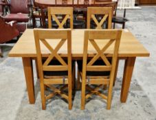 Modern oak extending dining room table of rectangular form having one additional leaf to end, on