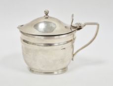 George V silver mustard pot, London 1910, Samuel Walton Smith, of oval form with blue glass liner,
