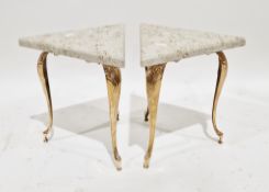 Pair of coffee tables of triangular form having marble tops, on moulded capped acanthus leaf