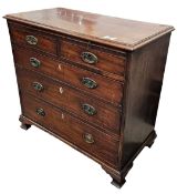 19th Century mahogany chest of drawers, retractable writing tray above 2 short over 3 long
