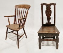 19th century lath and stickback elbow chair, with an elm saddle seat, on turned legs united by an