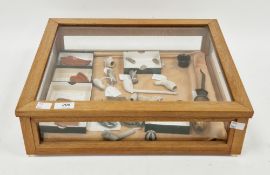 Table-top collector's glazed cabinet containing a collection of curios including five Roman samian