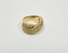 Lady's 9ct gold crossover ring set with peridots, gross weight 10.1g approx, ring size N