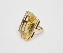 9ct gold and citrine dress ring, the rounded rectangular cut stone claw set, 3.5cm x 2.5cm Condition