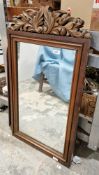Early 20th century mahogany framed rectangular mirror with foliate carved cresting, 90cm x 48cm