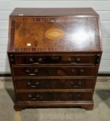 20th century mahogany bureau with inlaid marquetry conch shell, partially fitted interior over