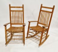 Pair of Cotswold School style ash rocking chairs, with spindle backs and shaped slatted seats, on